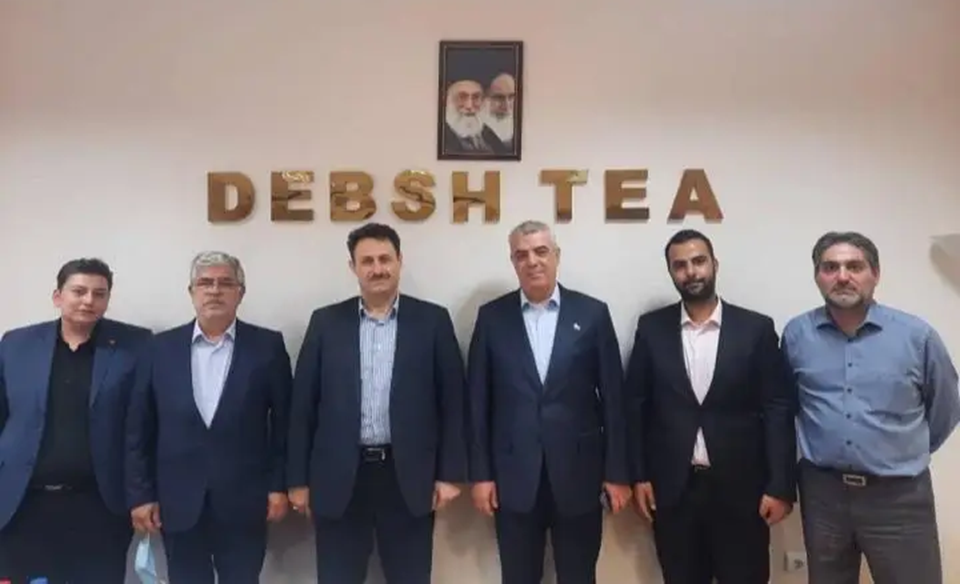Debsh Tea executives, CEO Akbar Rahimi (4th left). Photo appears on Debsh website.